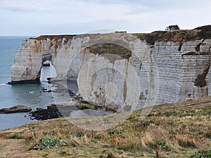 Beautiful striking rock formations carved out of white cliffs in Etretat