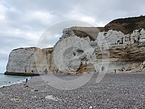 Beautiful striking rock formations carved out of white cliffs in Etretat