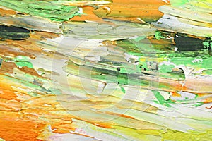 Beautiful strokes of colorful oil paints as background, closeup