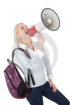 Beautiful student girl shouting in megaphone