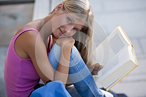 Beautiful student studying outdoors