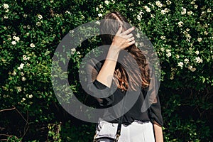 Beautiful Stylish Hipster Girl with beautiful windy hair having