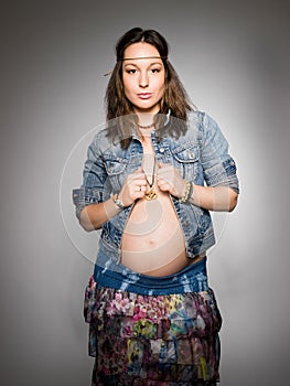 Beautiful stylish pregnant in hippy style