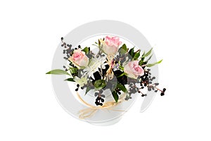 Beautiful, stylish vintage bouquet of pink roses, white chrysanthemum and black elderberry in a white metal bucket, isolated on a