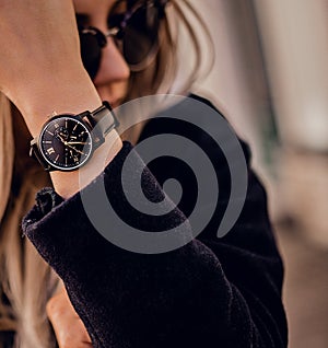 Beautiful stylish watch on woman hand