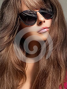 Beautiful stylish woman wearing chic sunglasses, fashionable beauty and feminine style portrait, fashion accessory and classy