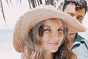 Beautiful stylish young woman portrait with hat shadow on face