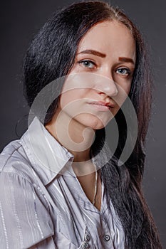 Beautiful successful young woman studio portrait