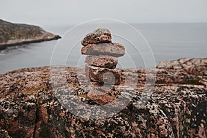 Beautiful summer day landscape abandoned artnature coastal defense North Teriberka, Barents sea view.