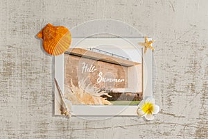 Beautiful summer holiday, Photo frame and shells on cement wall