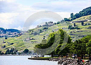 Beautiful Summer landscape of Lake Geneva, Lavaux vineyard terraces and Alps, Lutry village, Switzerland, Europe