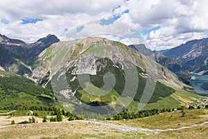Beautiful summer landscape with Monte Motto and Lake Livigno, Italy