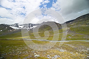 A beautiful summer landscape of mountain river in Sarek National Park, Sweden.