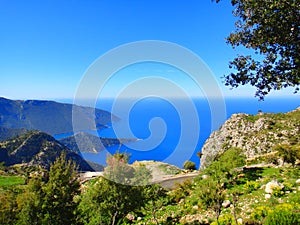 Beautiful Summer Landscape: mountains, blue sea, green trees.