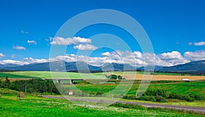 Beautiful summer landscape with the road against Tatra mountains