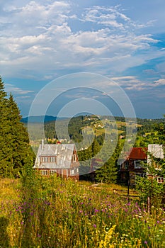 Beautiful summer landscape of village among Karpaty mountains