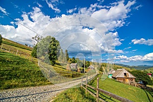 Beautiful summer landscape of village among Karpaty mountains