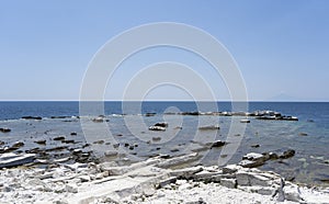 Beautiful summer Mediterranean coast with large sea stones