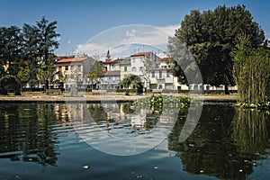Beautiful summer park with lake ay Pistoia