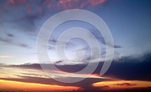 Beautiful summer purple sunset on the background of clouds