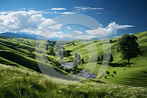 A beautiful summer or spring landscape with green grass on the hills and green fields. The blue sky is filled with white