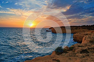 Beautiful summer sunset scene on Algarve coast, Portugal