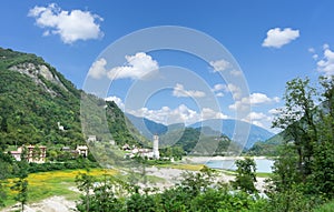 Beautiful summer view of the Arsie and Lake Corlo in Italy surrounded by the Alps.