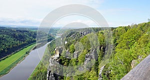 Beautiful summer view of Elbe river from Bastei view pont. Colorful morning scene of Saxon Switzerland national park