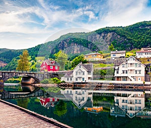 Beautiful summer view of Norheimsund village, located on the northern side of the Hardangerfjord. Colorful morning scene in Norway photo