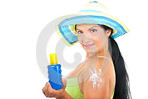 Beautiful summer woman with sun protection lotion