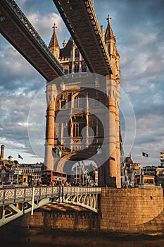 Beautiful sunny evening sunset view of the Tower Bridge with the cloudy blue sky