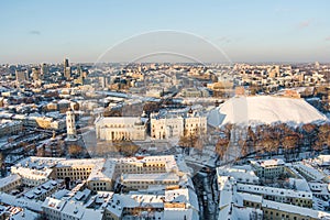 Beautiful sunny Vilnius city scene in winter. Christmas tree on the Cathedral square. Aerial early evening view. Winter scenery in