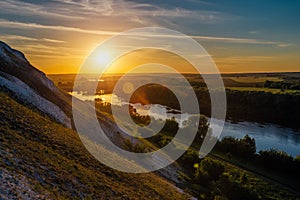 Beautiful sunrise above river Don and chalky hills, Voronezh region