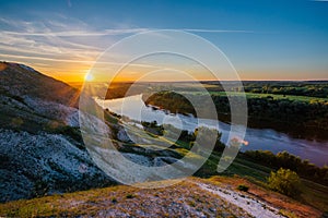 Beautiful sunrise above river Don and chalky hills, Voronezh region