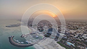 Beautiful Sunrise. Aerial View of Jumeirah Beach from Burj Al Arab, Dubai, UAE timelapse