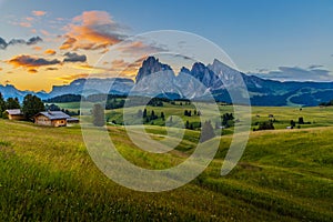 Beautiful sunrise at Alpe di siusi with langkofel mountain in Dolomites, Italy