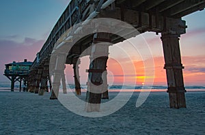 Sunrise at Sunglow Pier in Port Orange Florida photo
