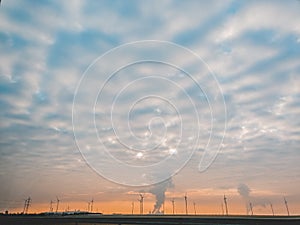 Beautiful sunrise behind the windmills