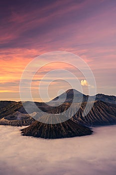 Beautiful sunrise at Bromo volcano mountain in East Java, Indonesia surrounded by morning fog