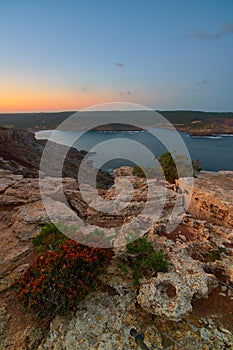 Sunrise from the cliff of Sa Punta Rotja photo