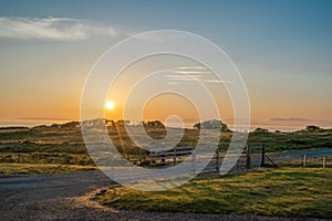 Beautiful Sunrise at the entrance of a farm.