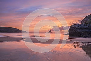 Beautiful sunrise landsdcape of idyllic Broadhaven Bay beach on