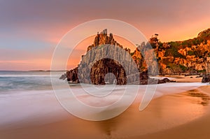 Beautiful sunrise light at Bingie Beach with soft motion flows