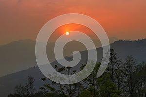 Beautiful sunrise in mountains of Himalayas, Hee Barmiok village of Sikkim, India. Great Himalayan mountain peaks in the