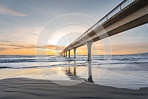 Beautiful sunrise at New Brighton Pier, Christchurch, New Zealand.