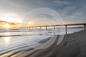 Beautiful sunrise at New Brighton Pier, Christchurch, New Zealand.