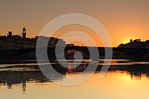 Beautiful sunrise over Arno river in old town of Florence