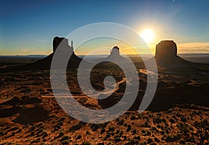 Beautiful sunrise over iconic Monument Valley