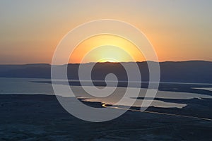 Beautiful sunrise over Masada fortress. Ruins of King Herod`s palace in Judean Desert, Israel