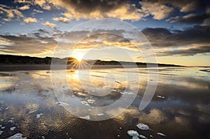 beautiful sunrise over North sea shore